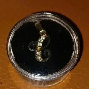 Gold plated letter pendant "E" with faux diamonds